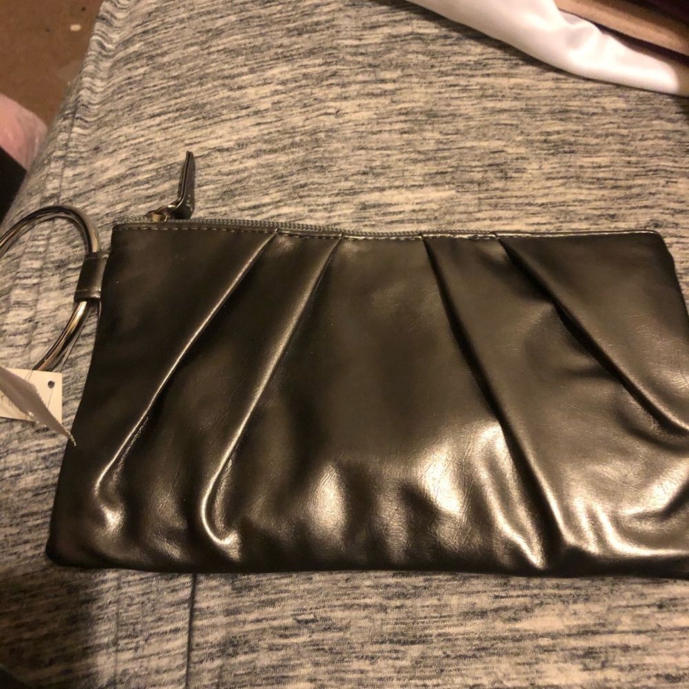 New never used clutch bag. Silver